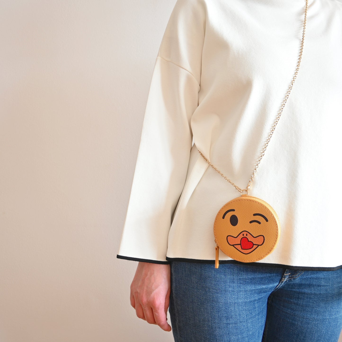 Ronda Blowing a Kiss in Yellow